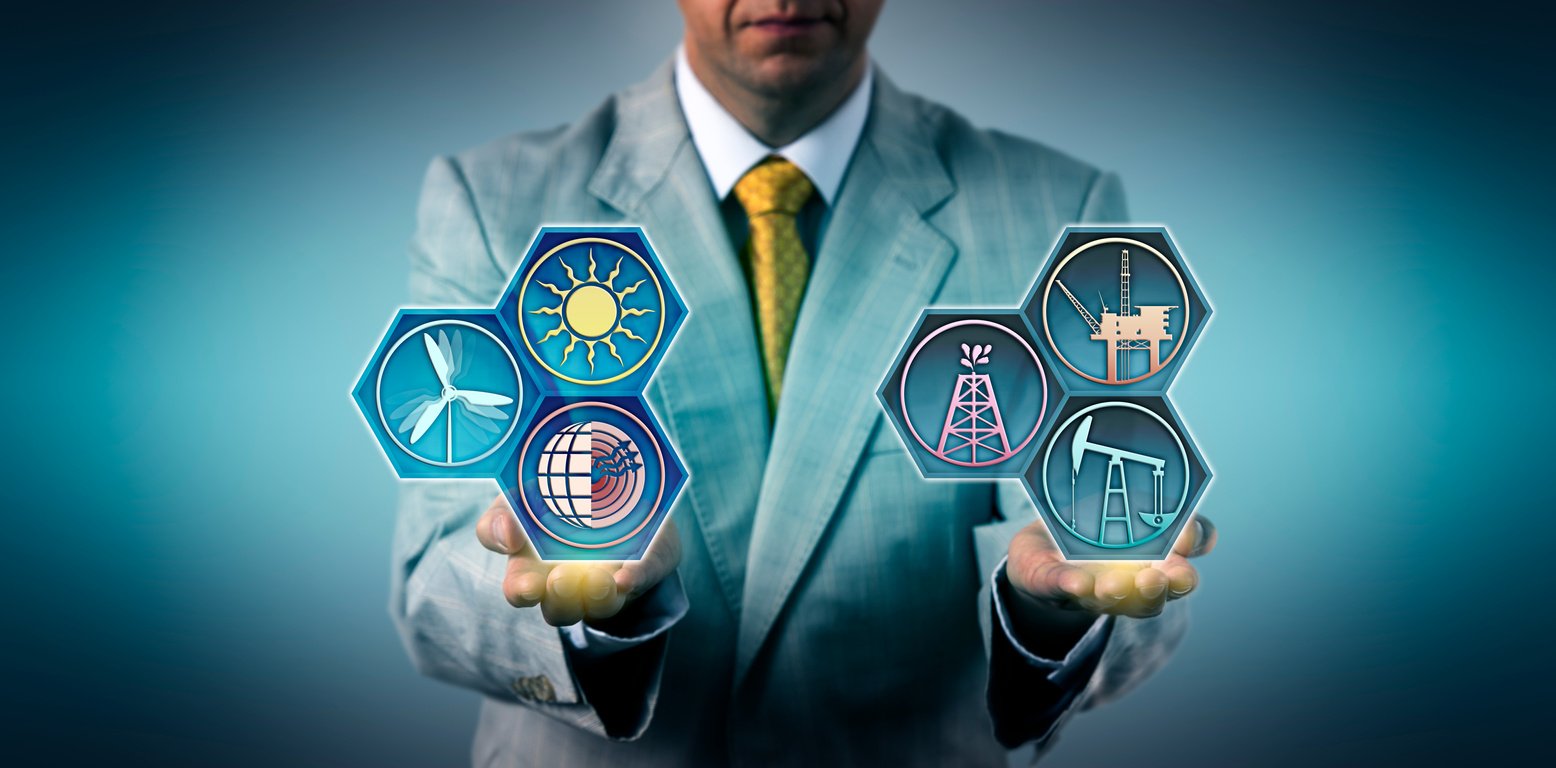 Manager Comparing Fossil And Renewable Energy